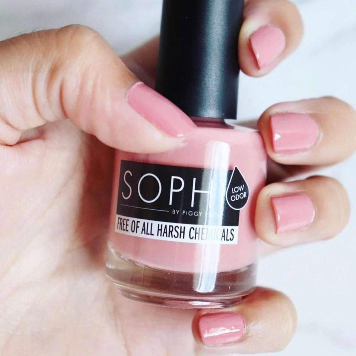 mid-tone neutral pink nail polish - respond with a kiss - essie